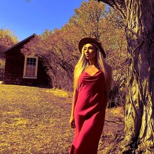 Red satin dress perfect for weddings and other special gatherings.